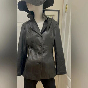 Wilson's leather 100% leather jacket is soft and shiny. Beautiful design